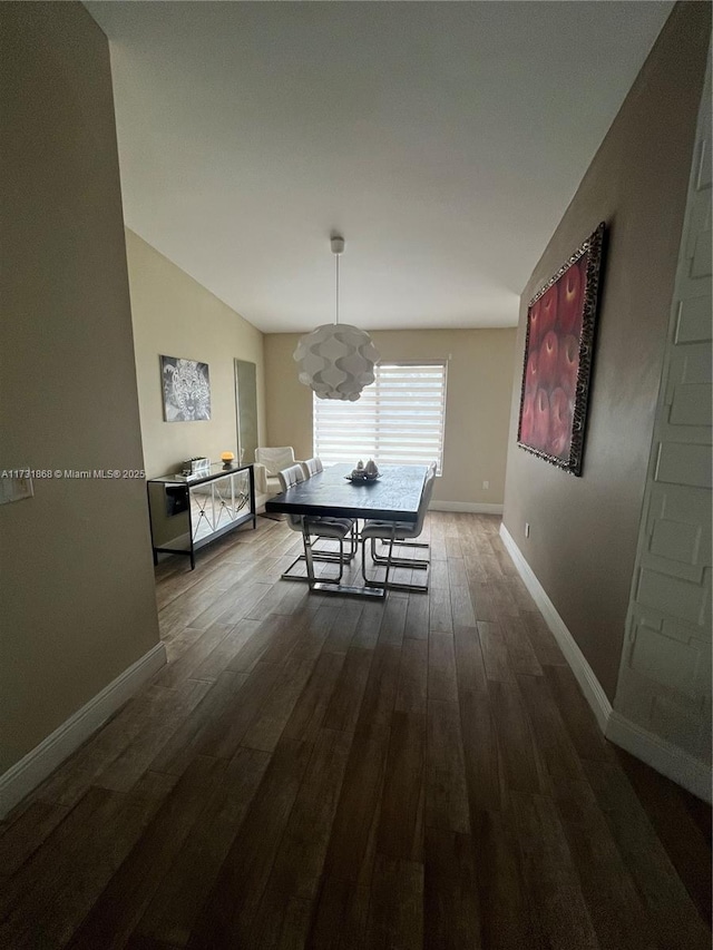 dining area with wood-type flooring