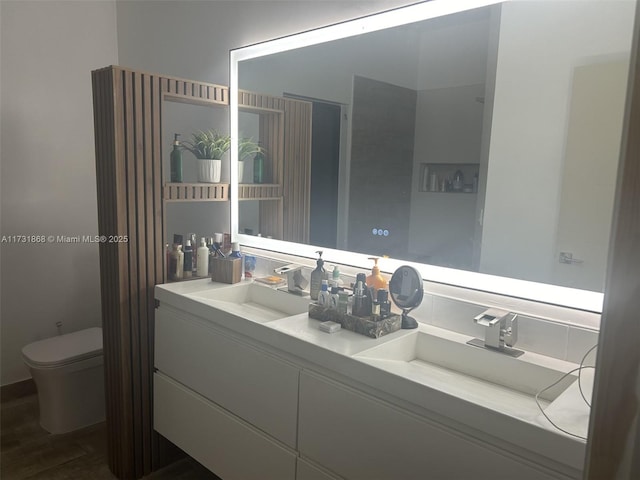 bathroom featuring vanity, hardwood / wood-style flooring, a shower with door, and toilet