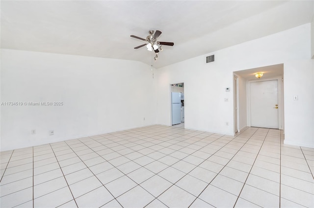 unfurnished room featuring vaulted ceiling and ceiling fan