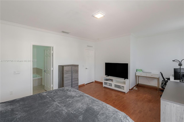 bedroom with wood-type flooring and ornamental molding