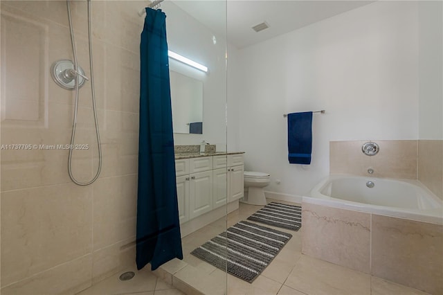 full bathroom featuring independent shower and bath, vanity, tile patterned floors, and toilet