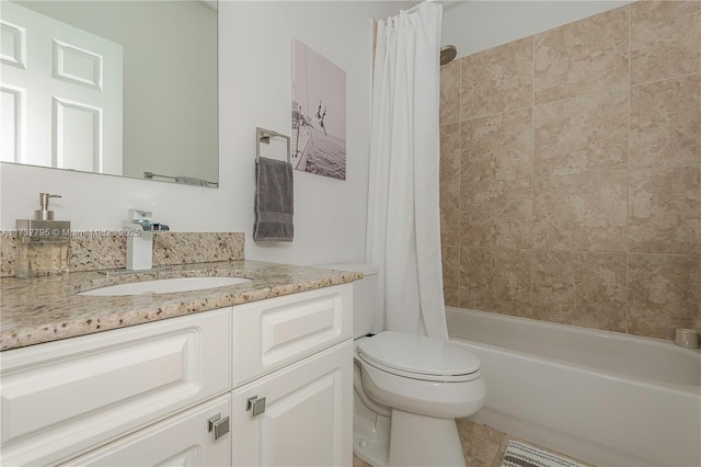 full bathroom with vanity, shower / bath combination with curtain, and toilet