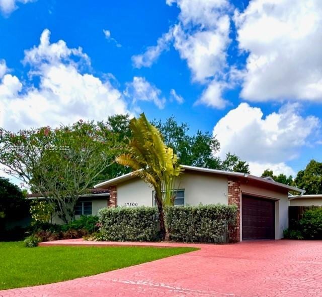 single story home with a garage