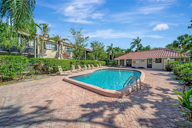 view of pool with a patio area