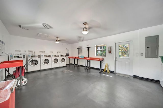 interior space featuring ceiling fan, electric panel, and washer and dryer