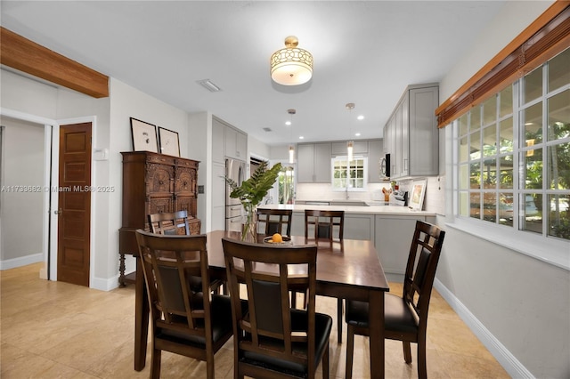 dining room featuring light tile patterned floors