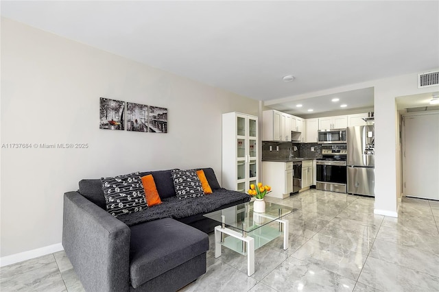 living room featuring sink