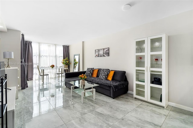 living room with floor to ceiling windows