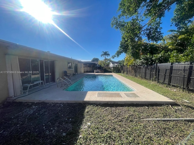 view of pool with a patio area