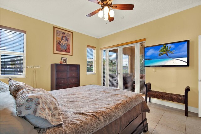 tiled bedroom with crown molding, access to exterior, and ceiling fan