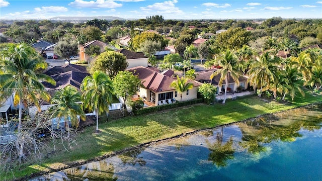 bird's eye view featuring a water view and a residential view