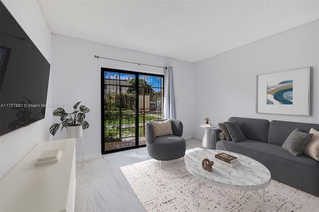 living room with a textured ceiling