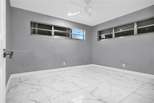 spare room featuring ceiling fan