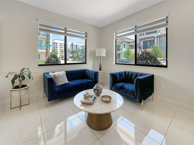 4745 NW 84th Ct Unit 15, Doral, FL 33166 - living area featuring baseboards, plenty of natural light, and tile patterned flooring