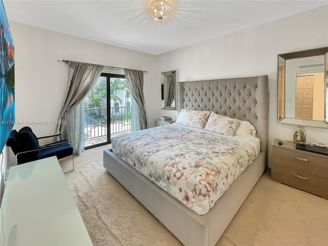 4745 NW 84th Ct Unit 15, Doral, FL 33166 - bedroom with light carpet and access to exterior