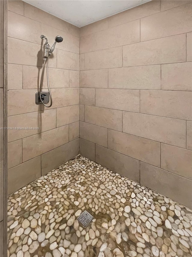 4745 NW 84th Ct Unit 15, Doral, FL 33166 - full bathroom with a tile shower