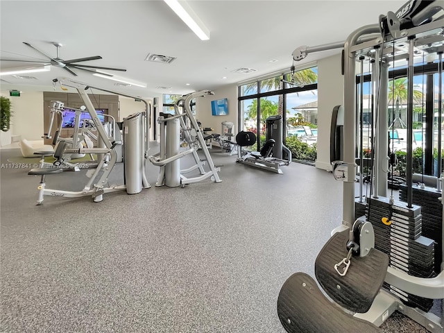 4745 NW 84th Ct Unit 15, Doral, FL 33166 - gym featuring visible vents and expansive windows