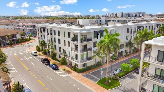 4745 NW 84th Ct Unit 15, Doral, FL 33166 - view of building exterior with a city view and uncovered parking