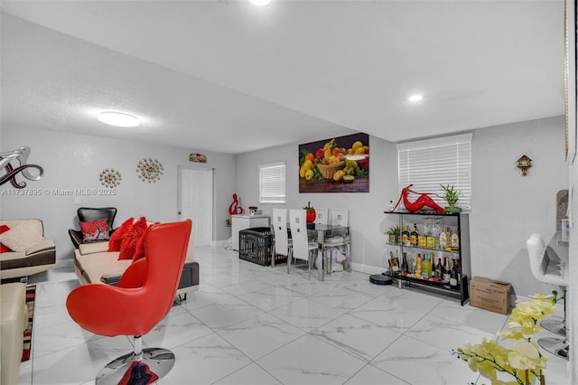 living room with a textured ceiling