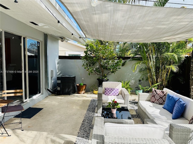 view of patio with central AC and an outdoor hangout area