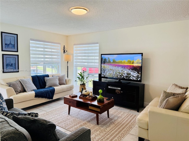 tiled living room with a textured ceiling