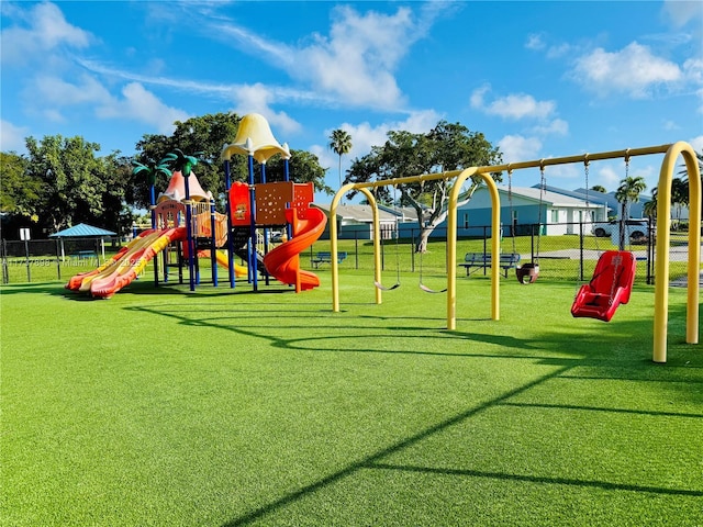 view of playground featuring a lawn