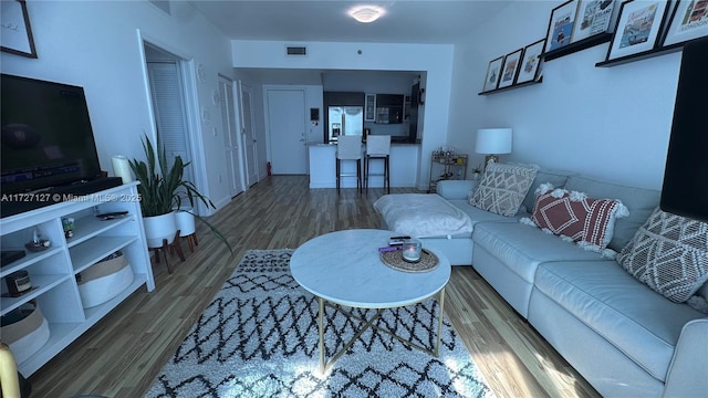 living room with hardwood / wood-style floors