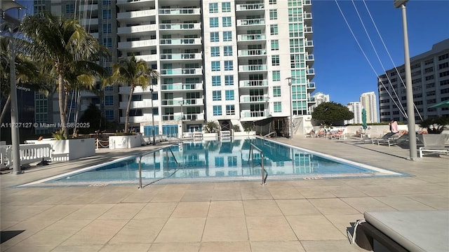 view of pool featuring a patio