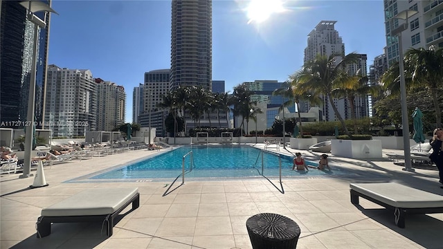 view of pool featuring a patio