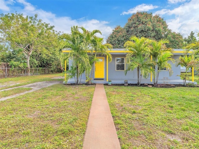 view of front of house with a front lawn