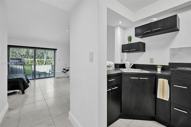 kitchen with sink and light tile patterned floors