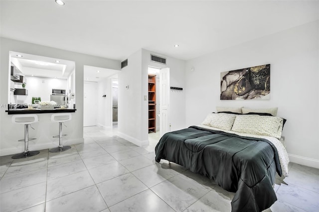 bedroom featuring a spacious closet