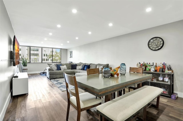 dining area featuring dark hardwood / wood-style flooring