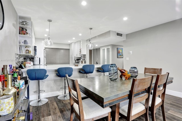 dining room featuring dark hardwood / wood-style floors