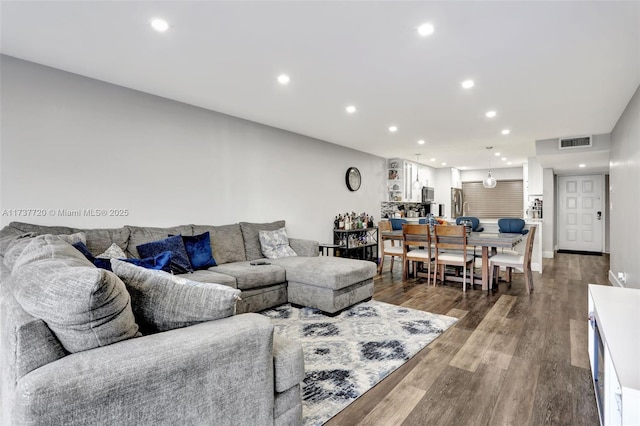 living room featuring hardwood / wood-style flooring