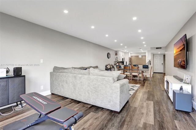 living room with hardwood / wood-style flooring