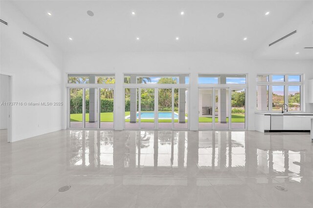 view of swimming pool featuring exterior kitchen, sink, a yard, and a patio area