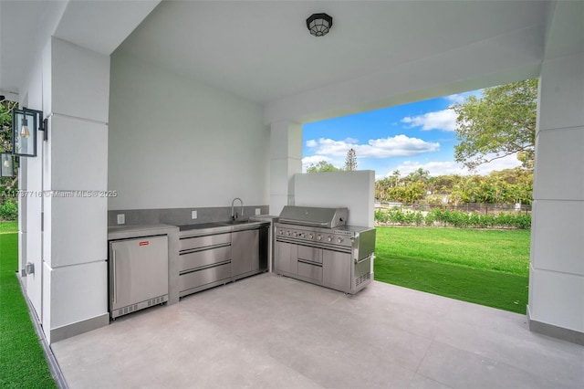 view of patio / terrace with sink and exterior kitchen