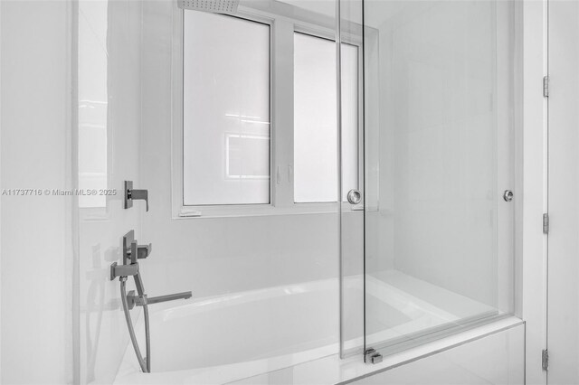 bathroom featuring walk in shower