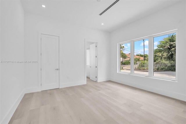 unfurnished bedroom featuring light hardwood / wood-style flooring