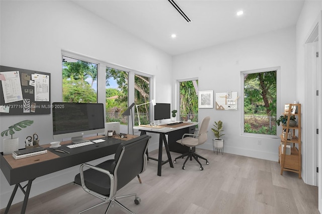 home office featuring light hardwood / wood-style flooring