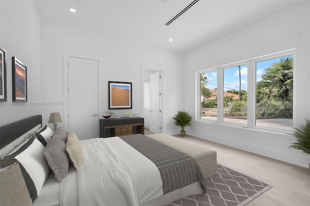 bedroom featuring light hardwood / wood-style flooring