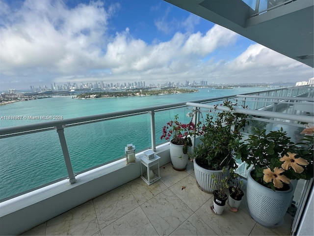 balcony featuring a water view