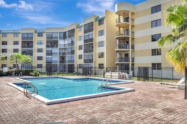 view of pool featuring a patio