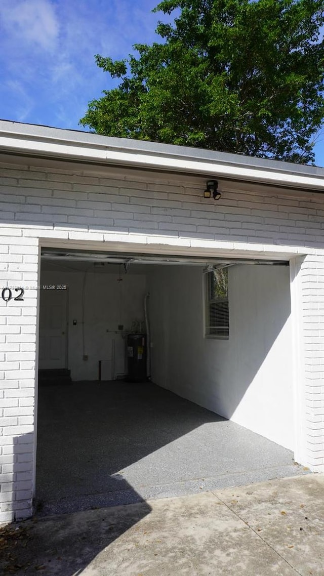 garage with electric water heater