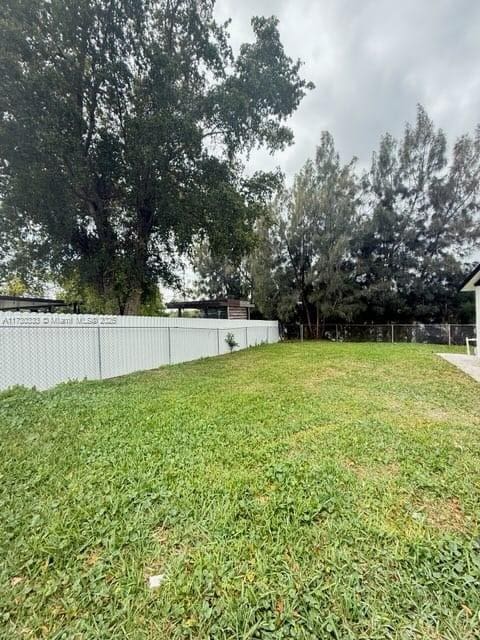 view of yard featuring fence