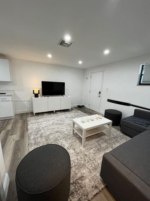 living room with wood-type flooring