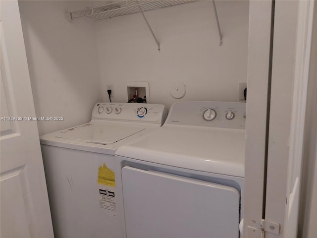 laundry room featuring independent washer and dryer