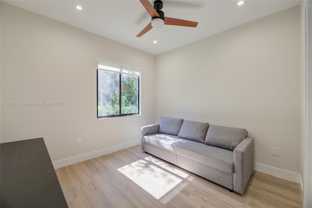sitting room featuring a ceiling fan, recessed lighting, baseboards, and light wood-type flooring