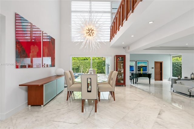 1251 Kane Concourse, Bay Harbor Islands, FL 33154 - dining space with a chandelier, marble tiled flooring, recessed lighting, and a high ceiling